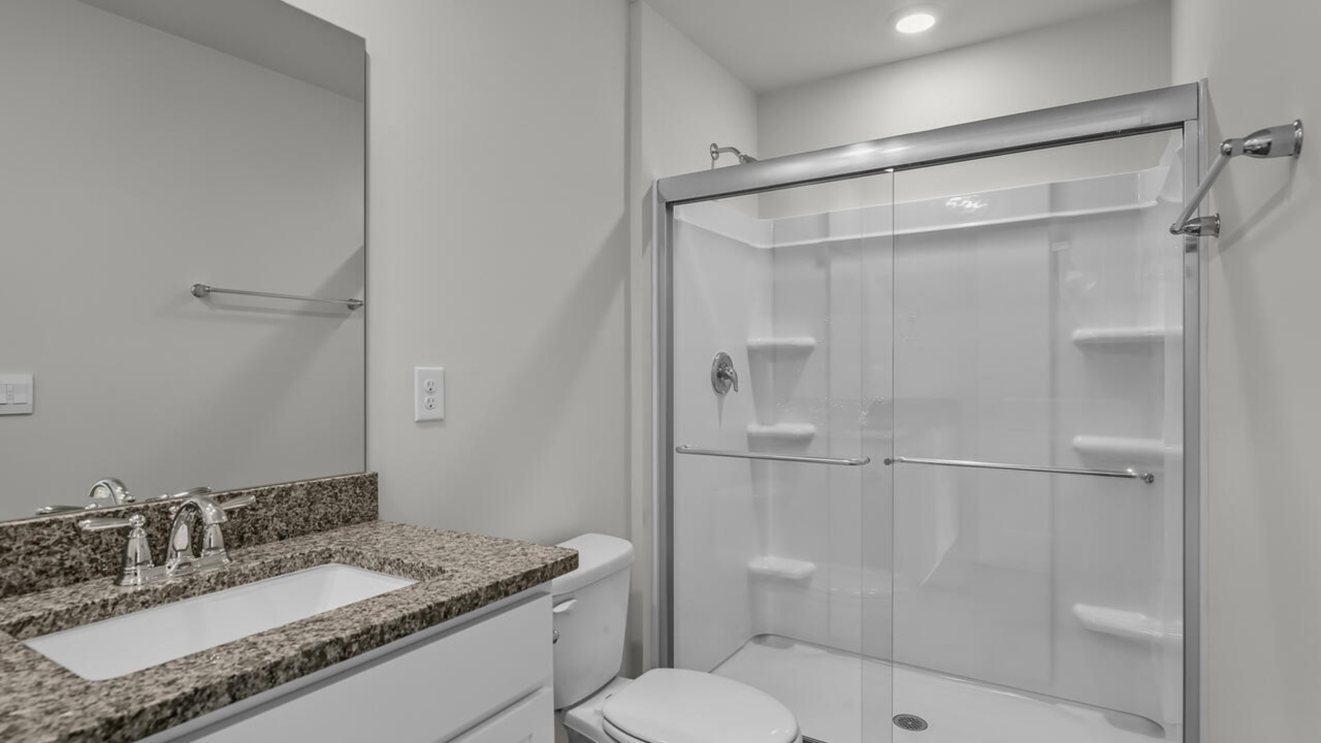 The second floor features the primary bedroom with a walk-in closet and double vanities. It