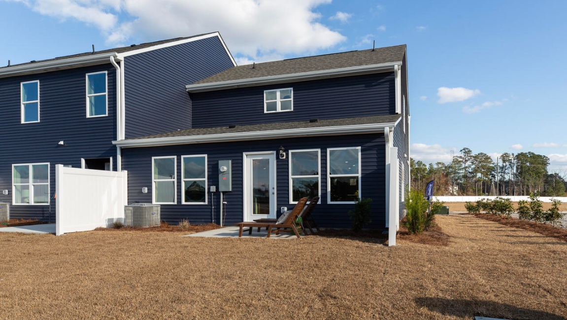 Enjoy the covered porch perfect for entertaining and enjoying the Carolina evenings.