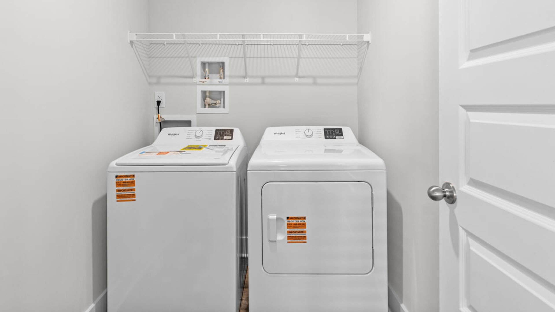 The primary suite is conveniently located just off the living room. The primary bedroom has its own attached bathroom that features a walk-in closet