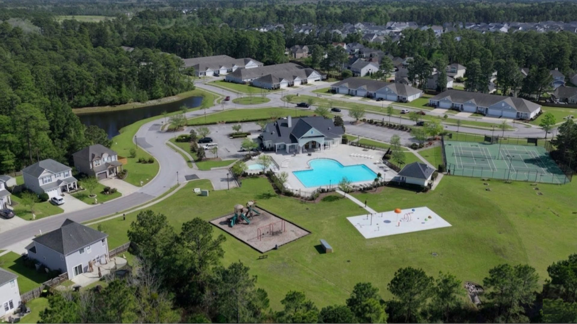 Residents have access to a range of amenities such as a well-equipped clubhouse, a fitness room, a spacious competition swimming pool, a kiddie pool, a hot tub, a sports court, a playground, and picturesque nature trails for walking.