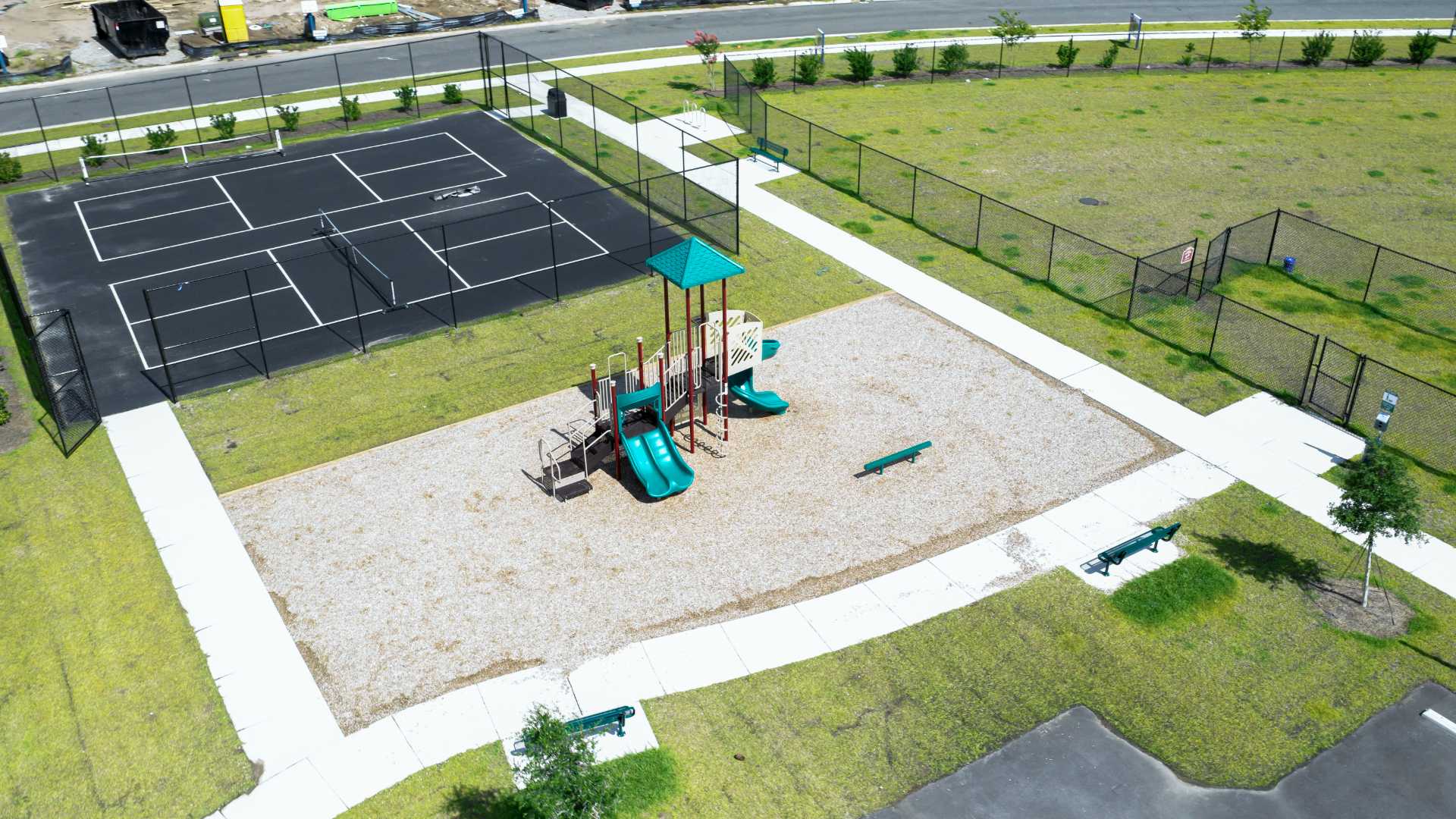 Homeowners have access to a range of amenities such as a well-equipped clubhouse, a fitness room, a spacious competition swimming pool, splashpad, a kiddie pool, a hot tub, a sports court, a playground, and picturesque nature trails for walking.