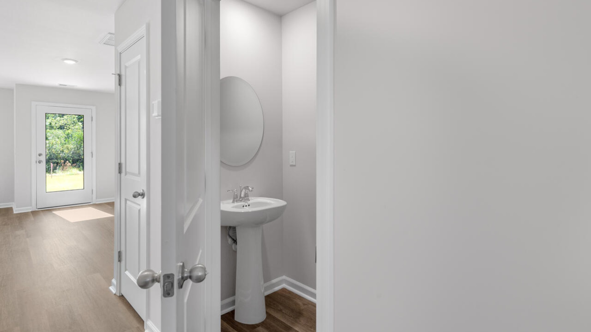 There is a half bath located downstairs.