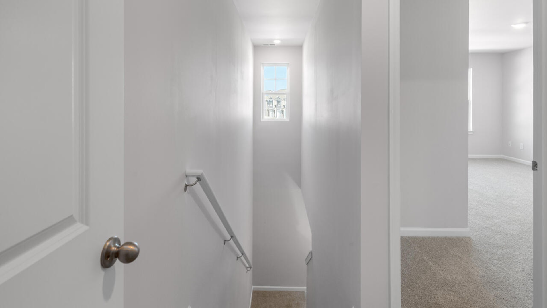 The second floor features the primary bedroom with a walk-in closet and double vanities