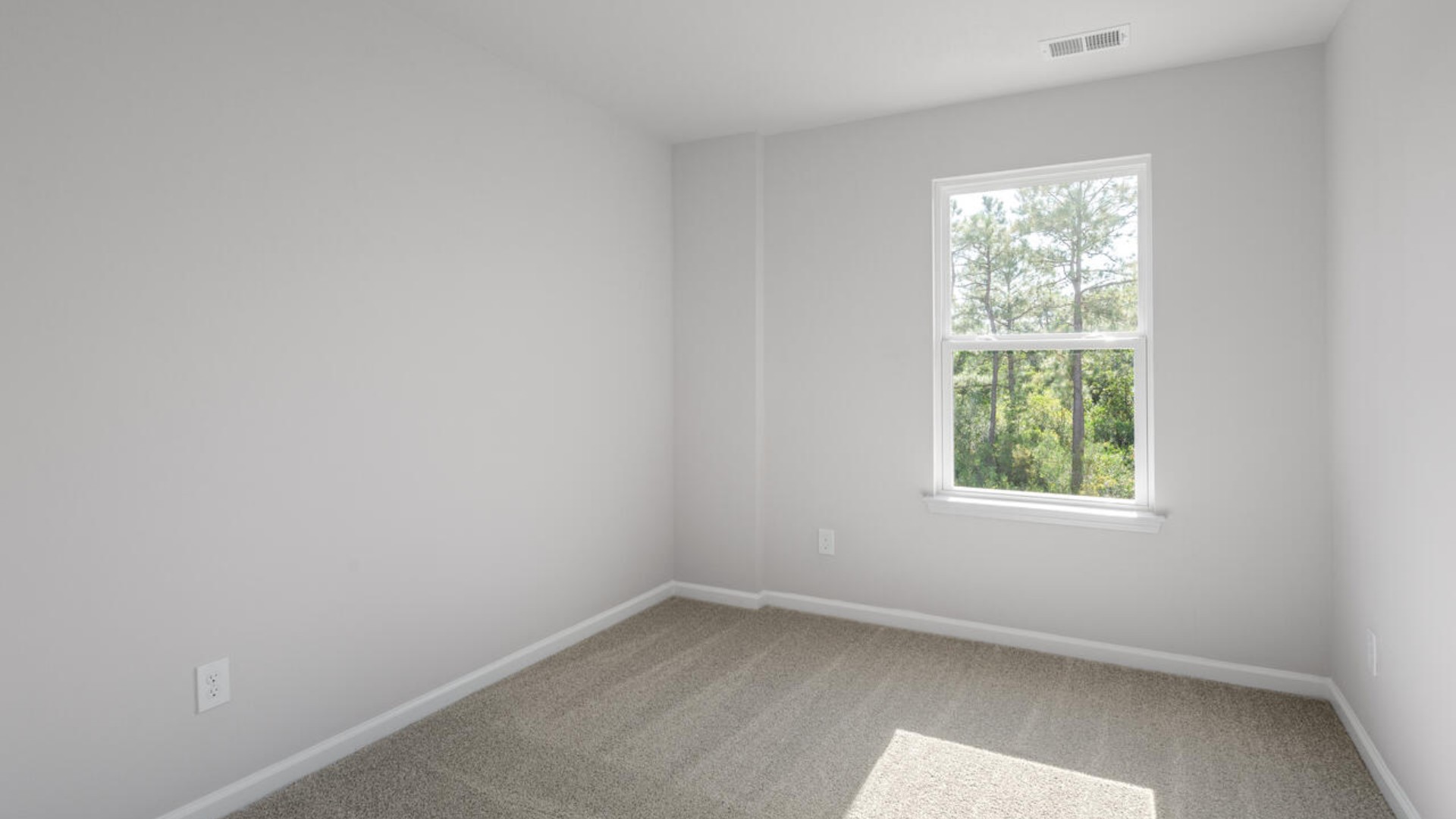 It also includes two additional bedrooms, a shared bathroom, and a laundry room for convenience. If