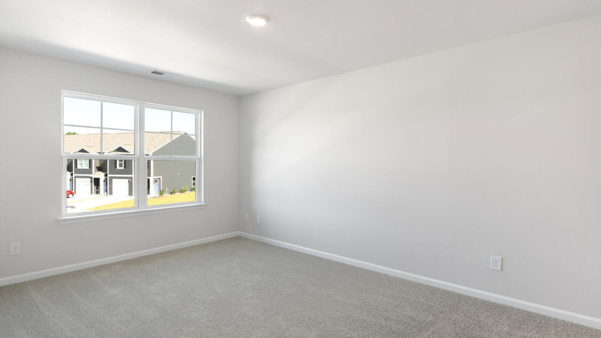 The second floor features the primary bedroom with a walk-in closet and double vanities.