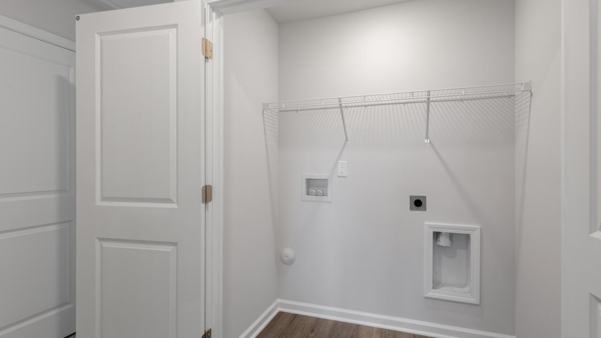 It also includes two additional bedrooms, a shared bathroom, and a laundry room for convenience. If you're looking for a functional and stylish two-story home, the Pearson is an excellent choice.