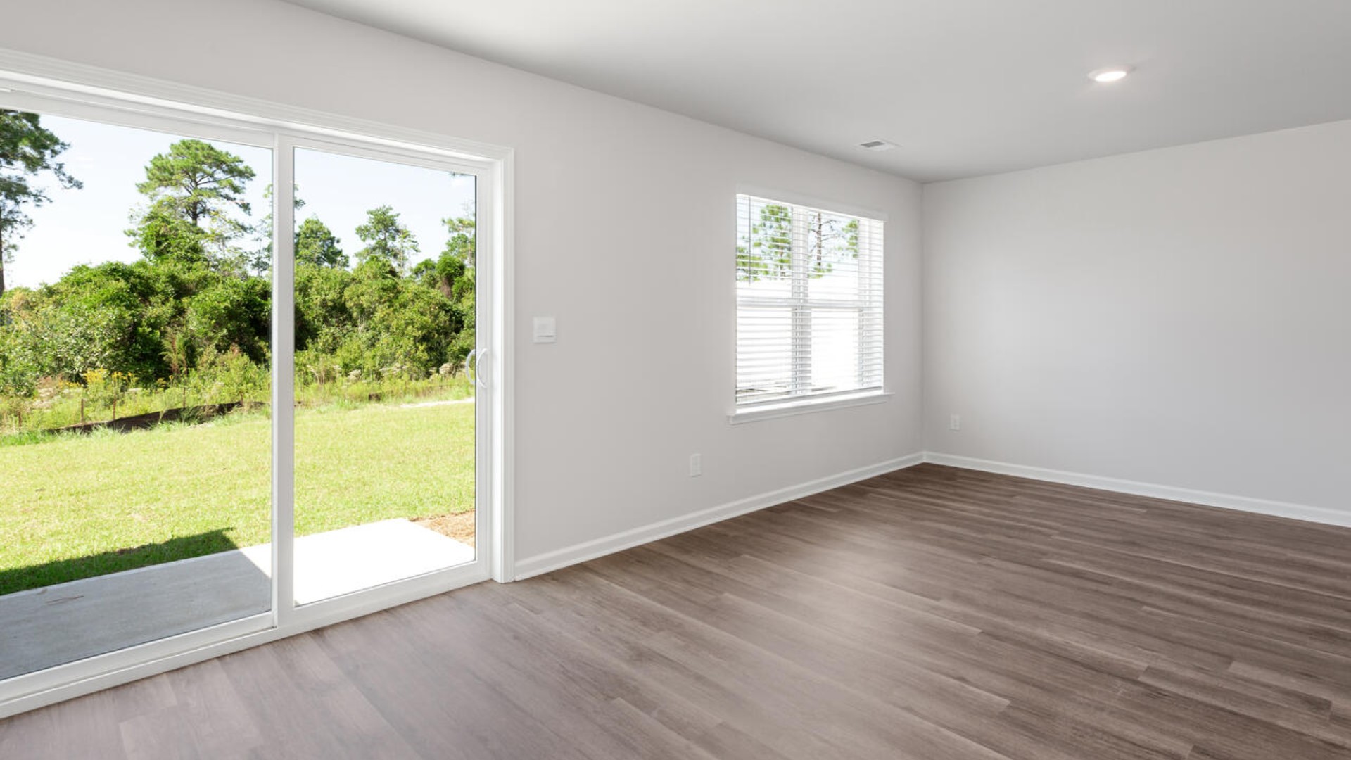 Your new Mitchell features an open concept first floor anchored by a spacious kitchen with a peninsula bar that overlooks your family and dining room