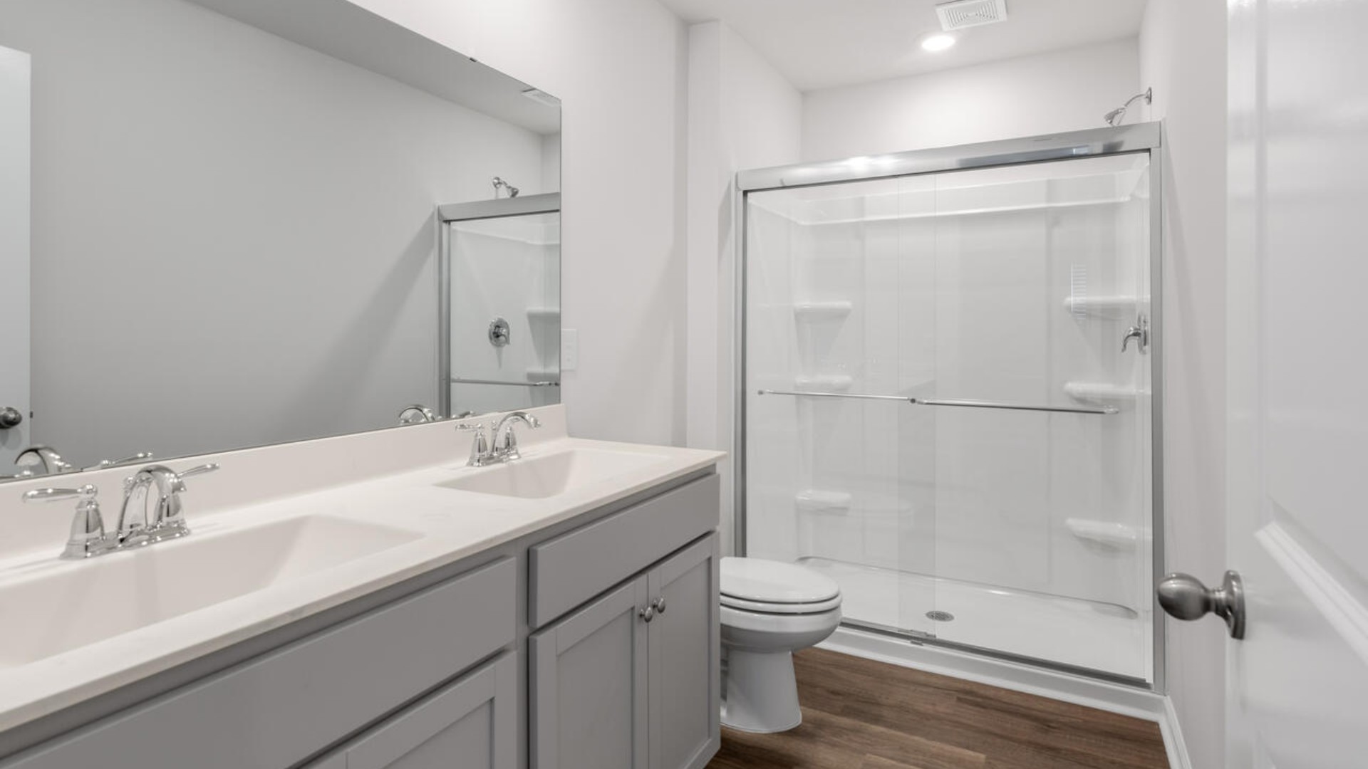 Upstairs you will find four bedrooms and 2 full baths. In every bedroom you’ll have carpeted floors and a closet in each room. Whether these rooms become bedrooms, office spaces, or other bonus rooms, there is sure to be comfort.