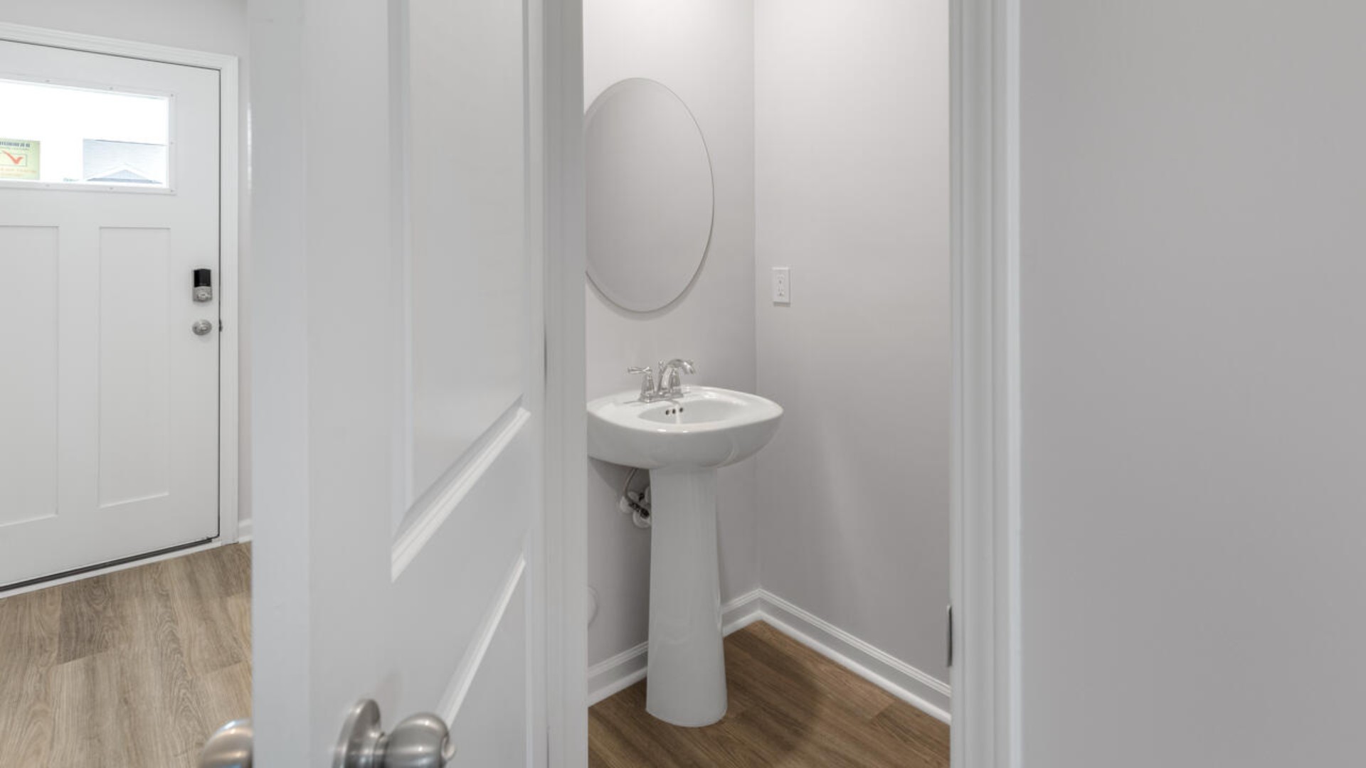 Your new Mitchell features an open concept first floor anchored by a spacious kitchen with a peninsula bar that overlooks your family and dining room.