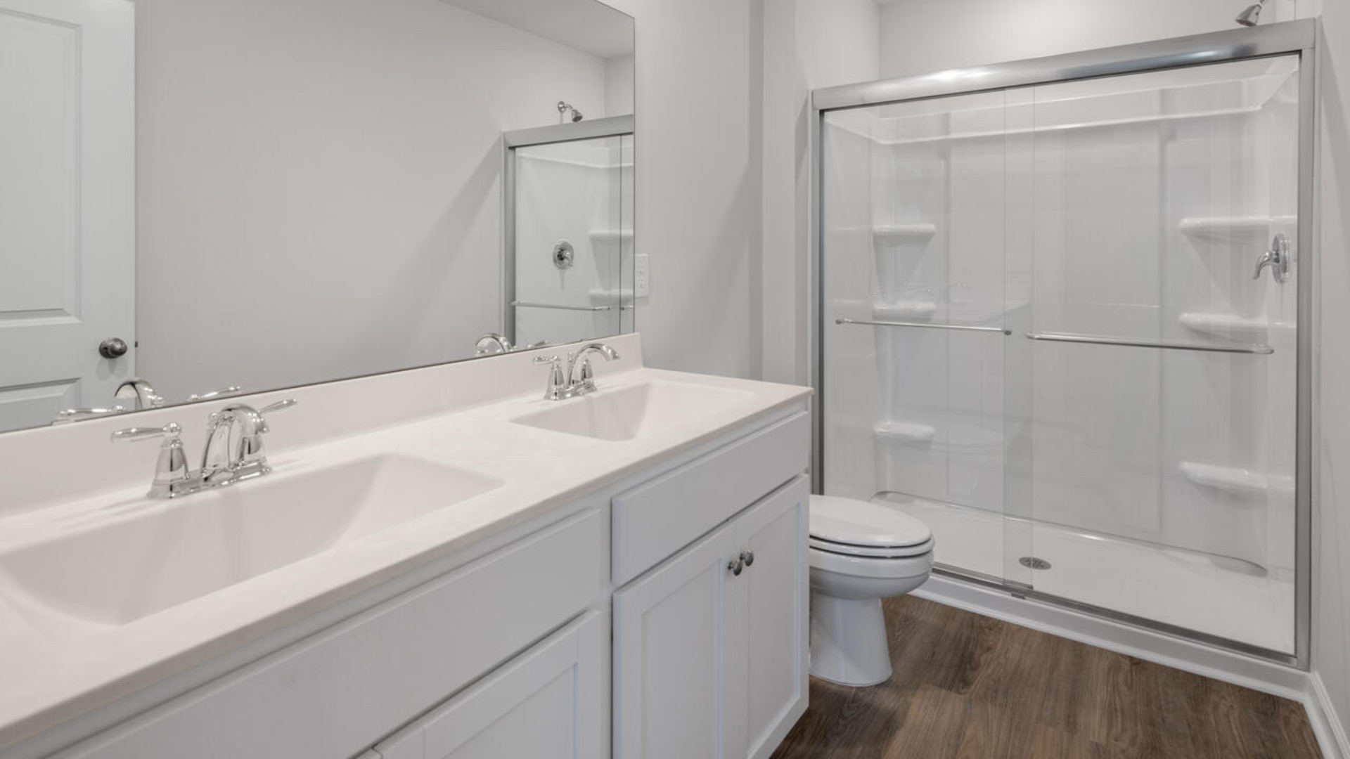 Your bedrooms are on the second floor with a large primary suite and bath with double vanities and walk in shower.