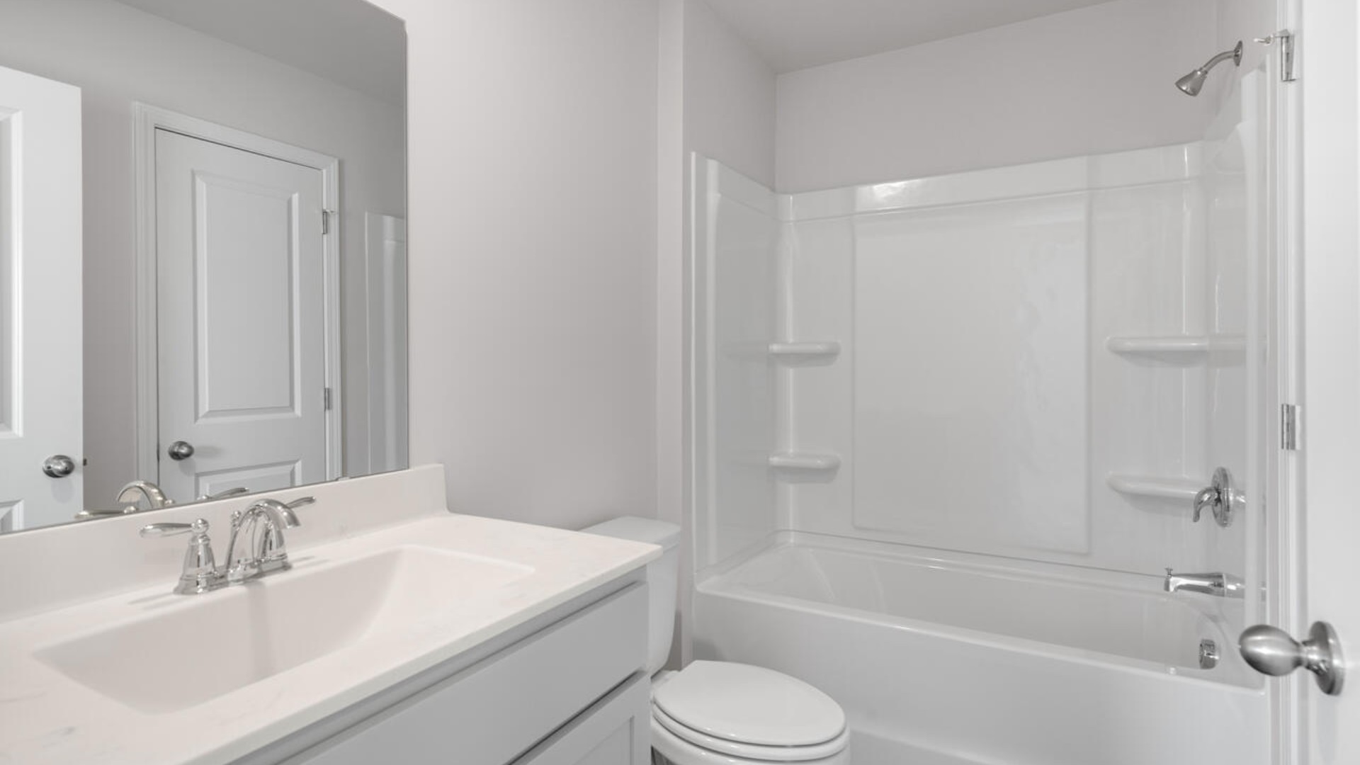 Your new Mitchell features an open concept first floor anchored by a spacious kitchen with a peninsula bar that overlooks your family and dining room. Your bedrooms are on the second floor with a large primary suite and bath with double vanities and walk in shower.