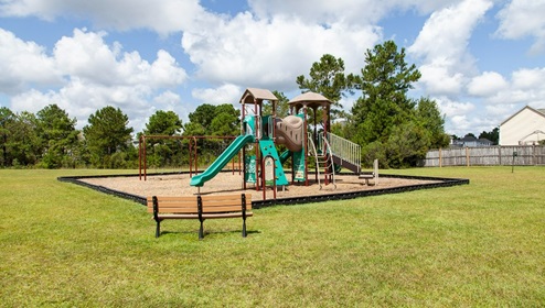 Residents have access to a range of amenities such as a well-equipped clubhouse, a fitness room, a spacious competition swimming pool, a kiddie pool, a hot tub, a sports court, a playground, and picturesque nature trails for walking.