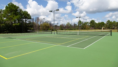 Residents have access to a range of amenities such as a well-equipped clubhouse, a fitness room, a spacious competition swimming pool, a kiddie pool, a hot tub, a sports court, a playground, and picturesque nature trails for walking.