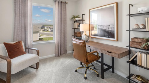 Upstairs, the primary bedroom has a walk-in closet and double vanities