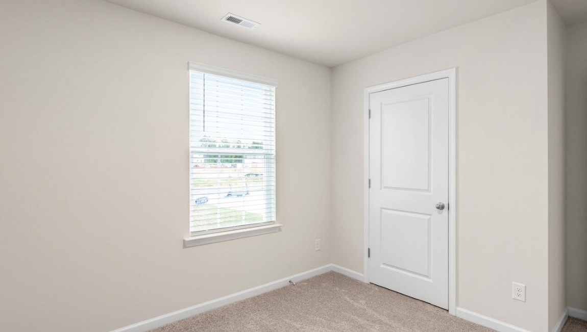 Need privacy? The primary suite is tucked away in the back of the home, offering a peaceful retreat complete with a walk-in shower, granite vanity, and a roomy walk-in closet. Three additional bedrooms are located up front- perfect for guests, kids, or a home office setup.  And don't forge