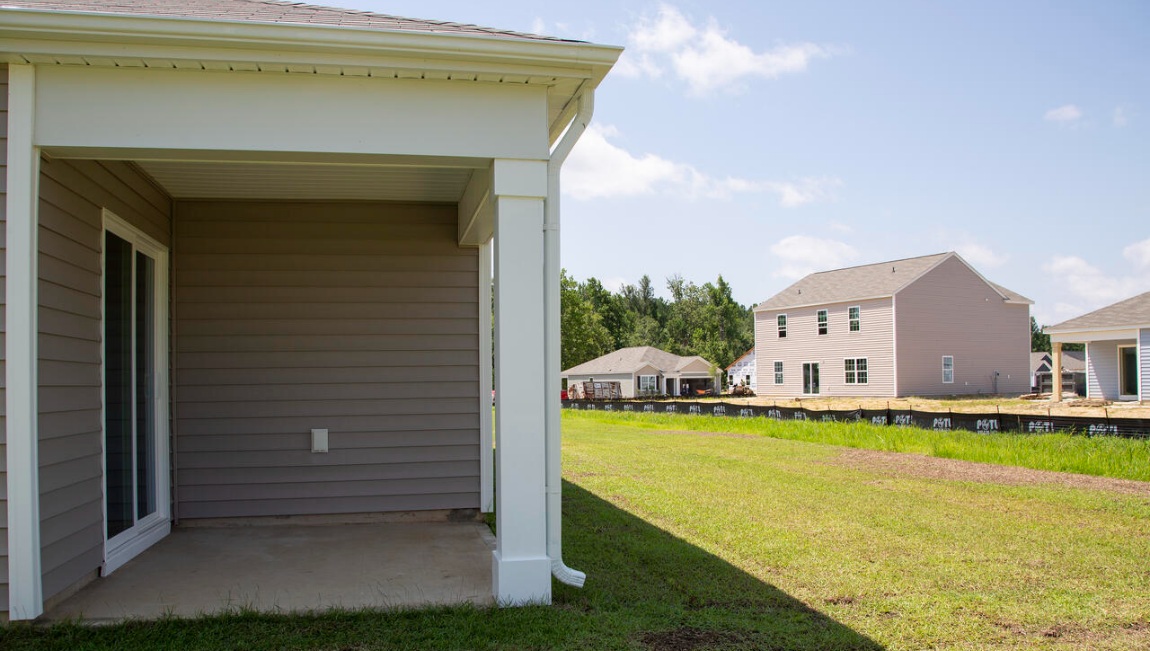 Enjoy the covered porch perfect for entertaining and enjoying the Carolina evening