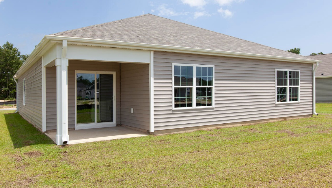 Enjoy the covered porch perfect for entertaining and enjoying the Carolina evening