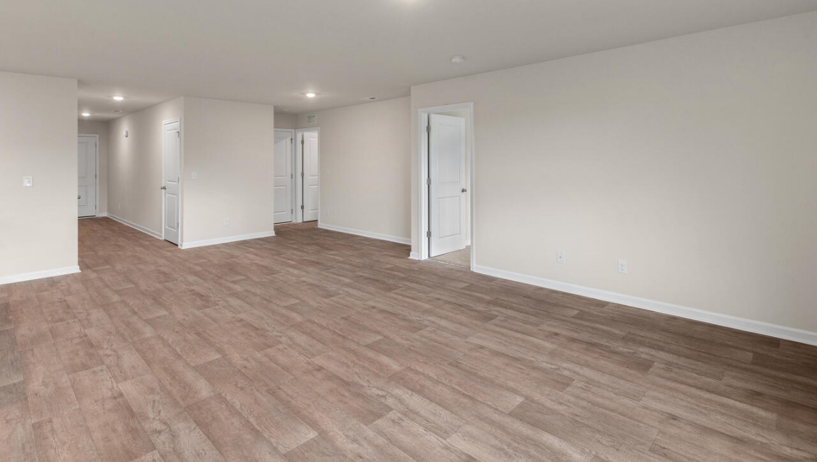 Need privacy? The primary suite is tucked away in the back of the home, offering a peaceful retreat complete with a walk-in shower, granite vanity, and a roomy walk-in closet. Three additional bedrooms are located up front- perfect for guests, kids, or a home office setup.  And don't forge