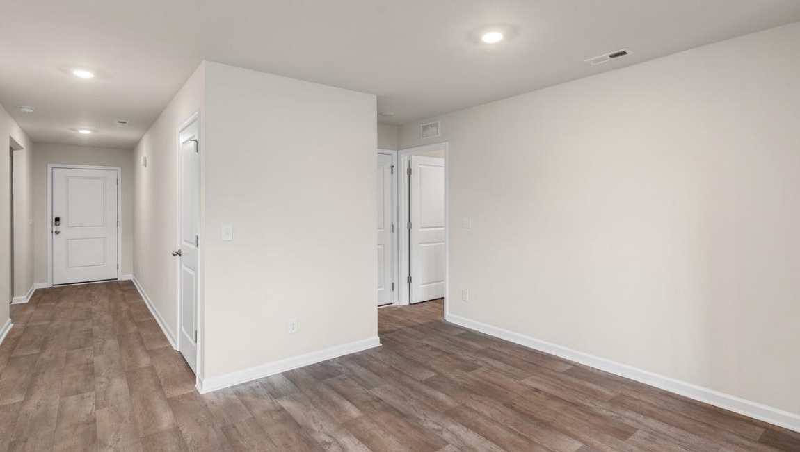 Need privacy? The primary suite is tucked away in the back of the home, offering a peaceful retreat complete with a walk-in shower, granite vanity, and a roomy walk-in closet. Three additional bedrooms are located up front- perfect for guests, kids, or a home office setup.  And don't forge