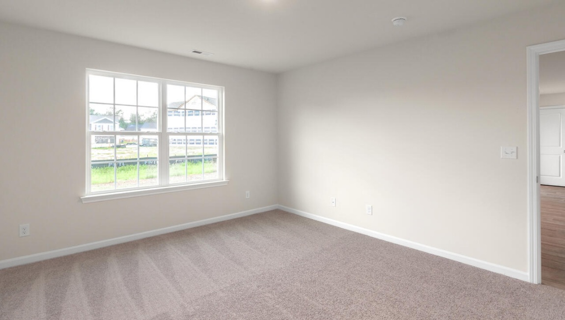 Need privacy? The primary suite is tucked away in the back of the home, offering a peaceful retreat complete with a walk-in shower, granite vanity, and a roomy walk-in closet. Three additional bedrooms are located up front- perfect for guests, kids, or a home office setup.  And don't forge