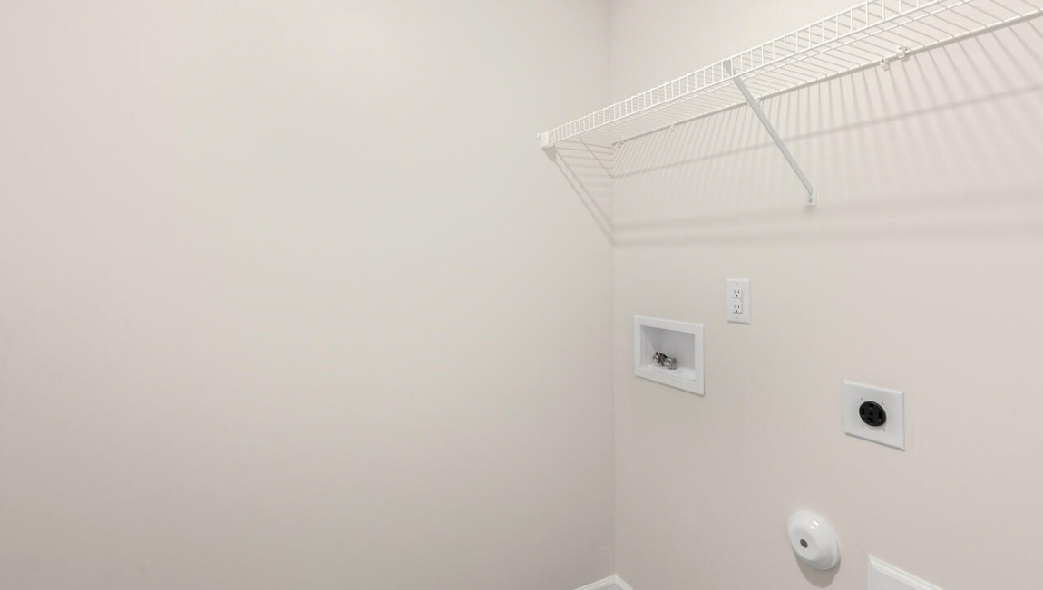 Need privacy? The primary suite is tucked away in the back of the home, offering a peaceful retreat complete with a walk-in shower, granite vanity, and a roomy walk-in closet. Three additional bedrooms are located up front- perfect for guests, kids, or a home office setup.  And don't forge