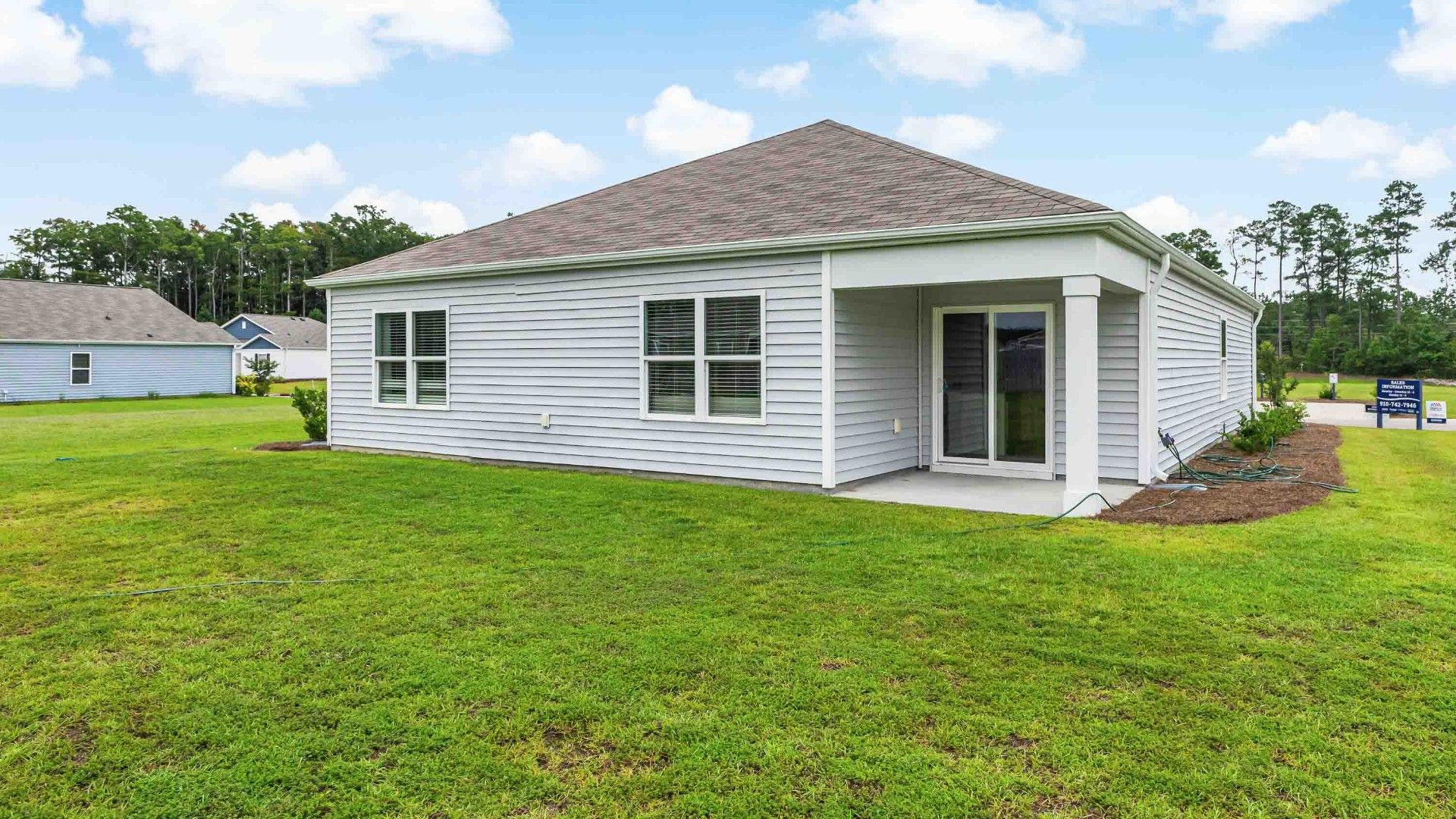 Enjoy the covered porch perfect for entertaining and enjoying the Carolina evenings.