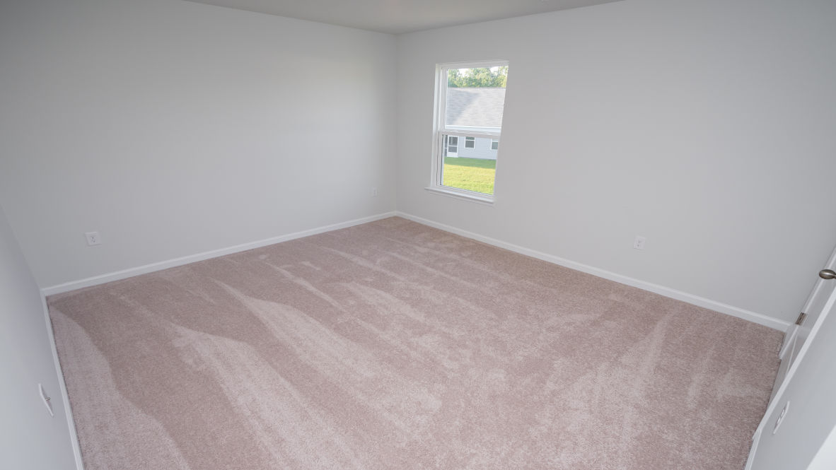 Upstairs offers large secondary bedrooms plus an expansive additional living area. In every bedroom you’ll have carpeted floors and a closet in each room