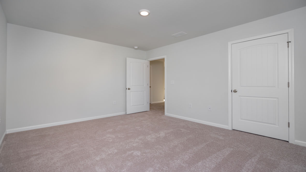 Upstairs offers large secondary bedrooms plus an expansive additional living area. In every bedroom you’ll have carpeted floors and a closet in each room