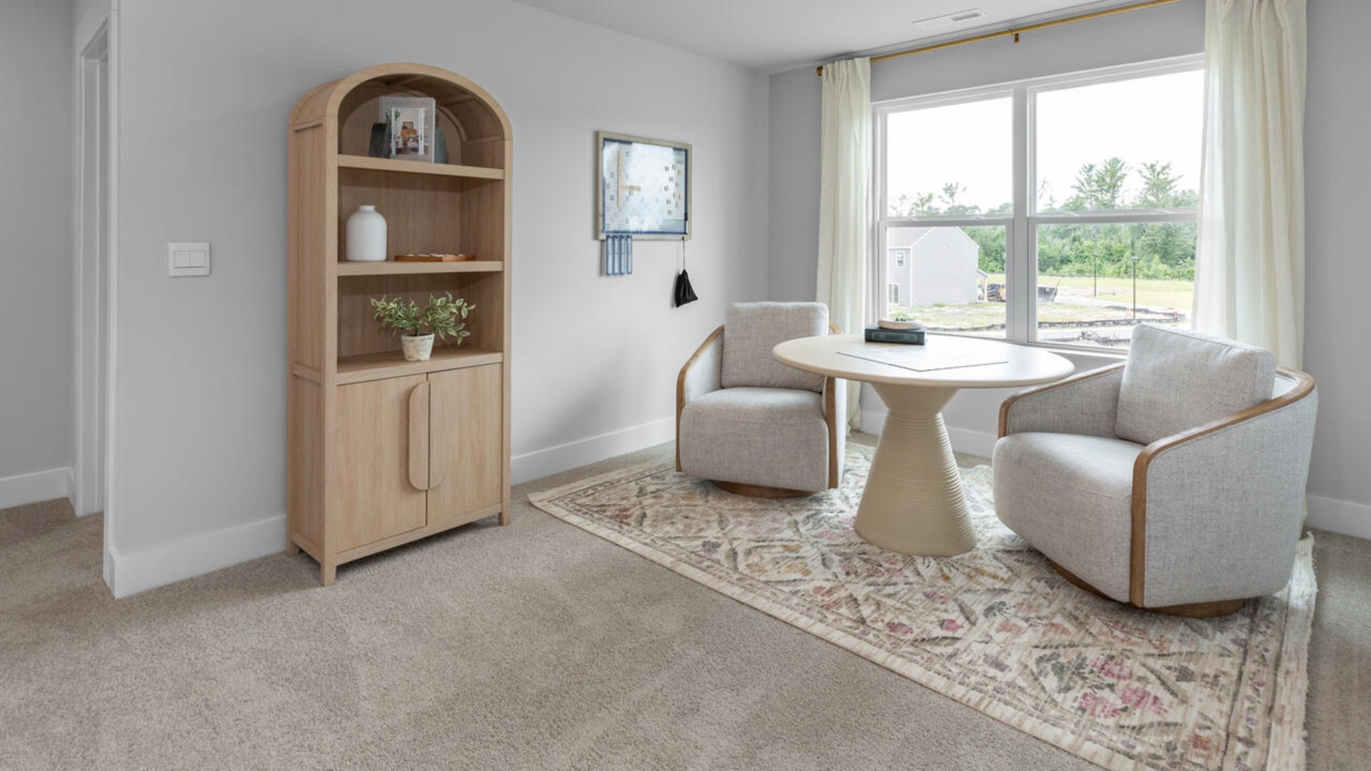 The upstairs has an additional living space, a laundry room, and a Primary Bedroom. Downstairs, a flex room can be used as an office or sitting area. In every bedroom you’ll have carpeted floors and a closet in each room. Whether these rooms become bedrooms, office spaces, or other bonus rooms, there is sure to be comfort.