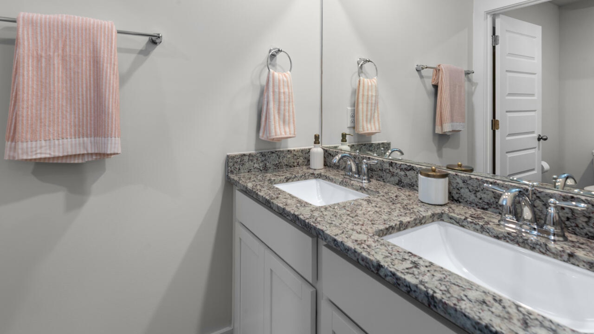 The upstairs has an additional living space, a laundry room, and a Primary Bedroom. Downstairs, a flex room can be used as an office or sitting area. In every bedroom you’ll have carpeted floors and a closet in each room. Whether these rooms become bedrooms, office spaces, or other bonus rooms, there is sure to be comfort.