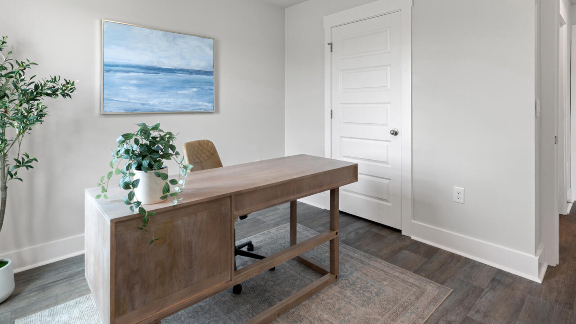 Downstairs, a flex room can be used as an office or sitting area.