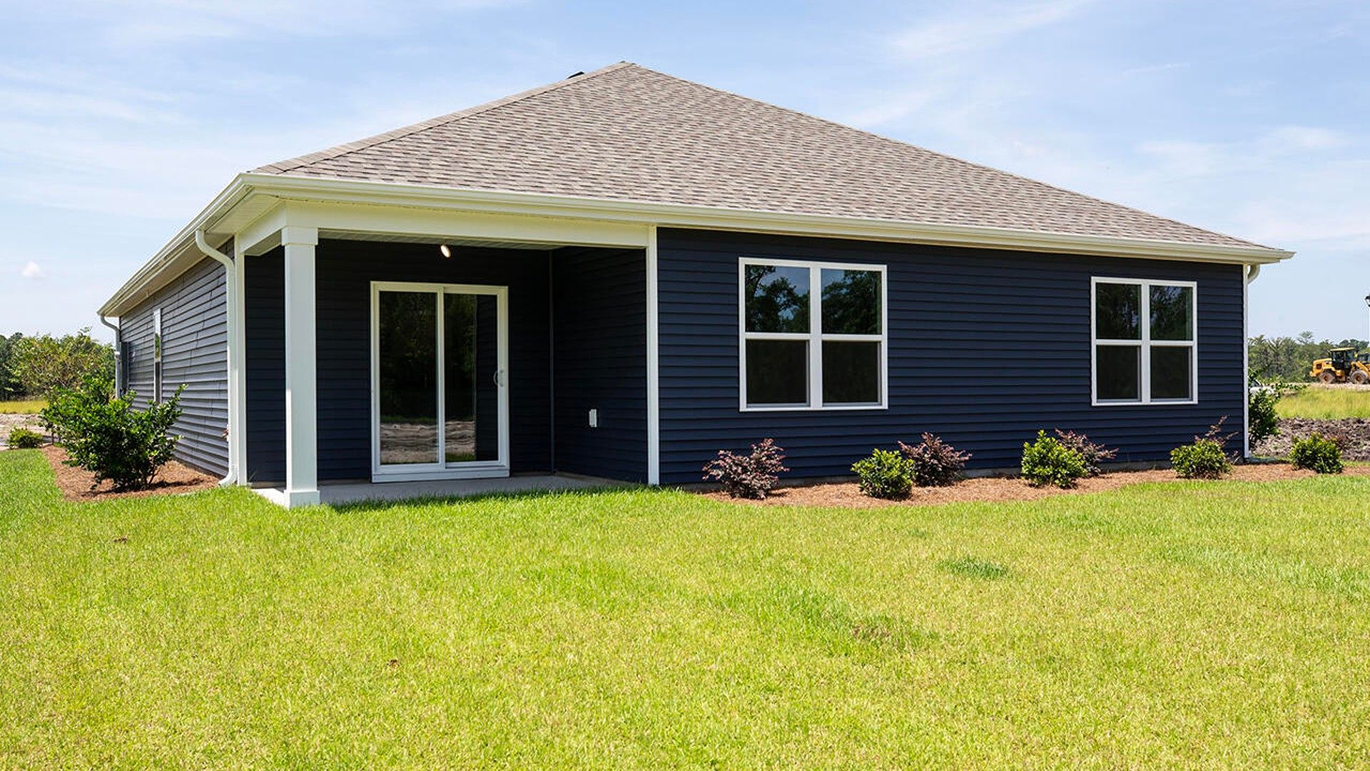 Enjoy the covered porch perfect for entertaining and enjoying the Carolina evenings.