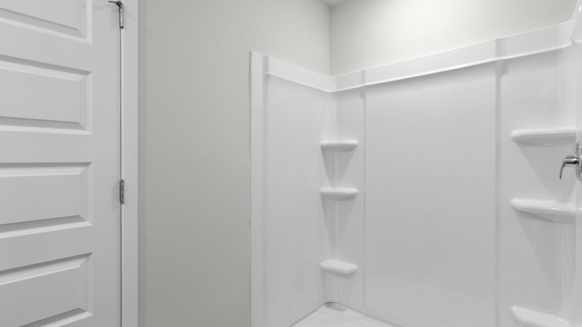 The upstairs has an additional living space, a laundry room, and a Primary Bedroom.