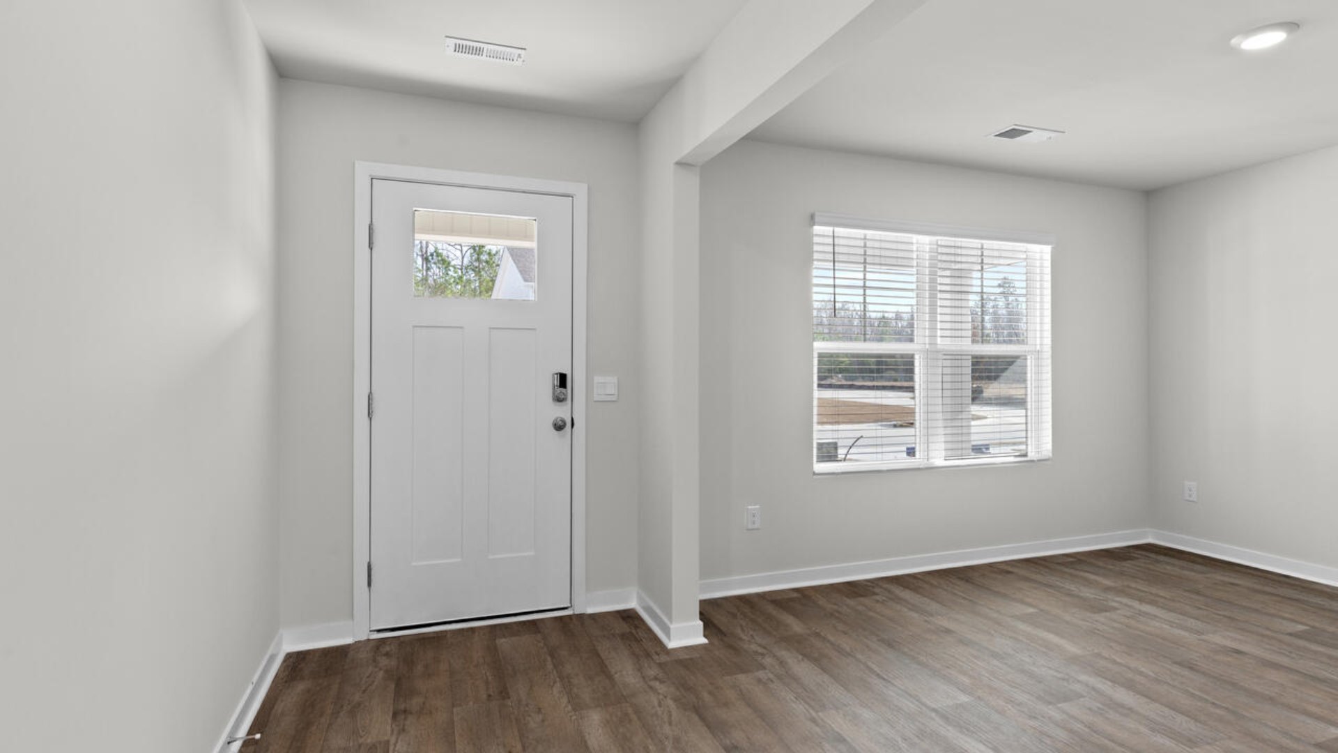 Downstairs, a flex room can be used as an office or sitting area.