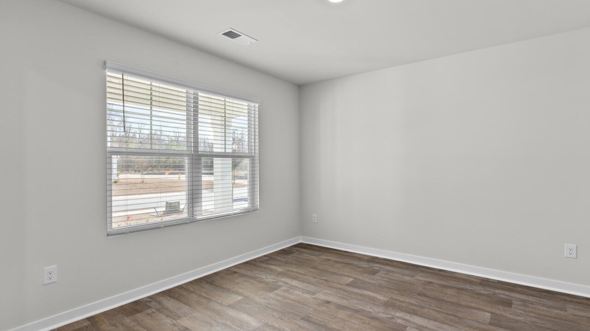 Downstairs, a flex room can be used as an office or sitting area.