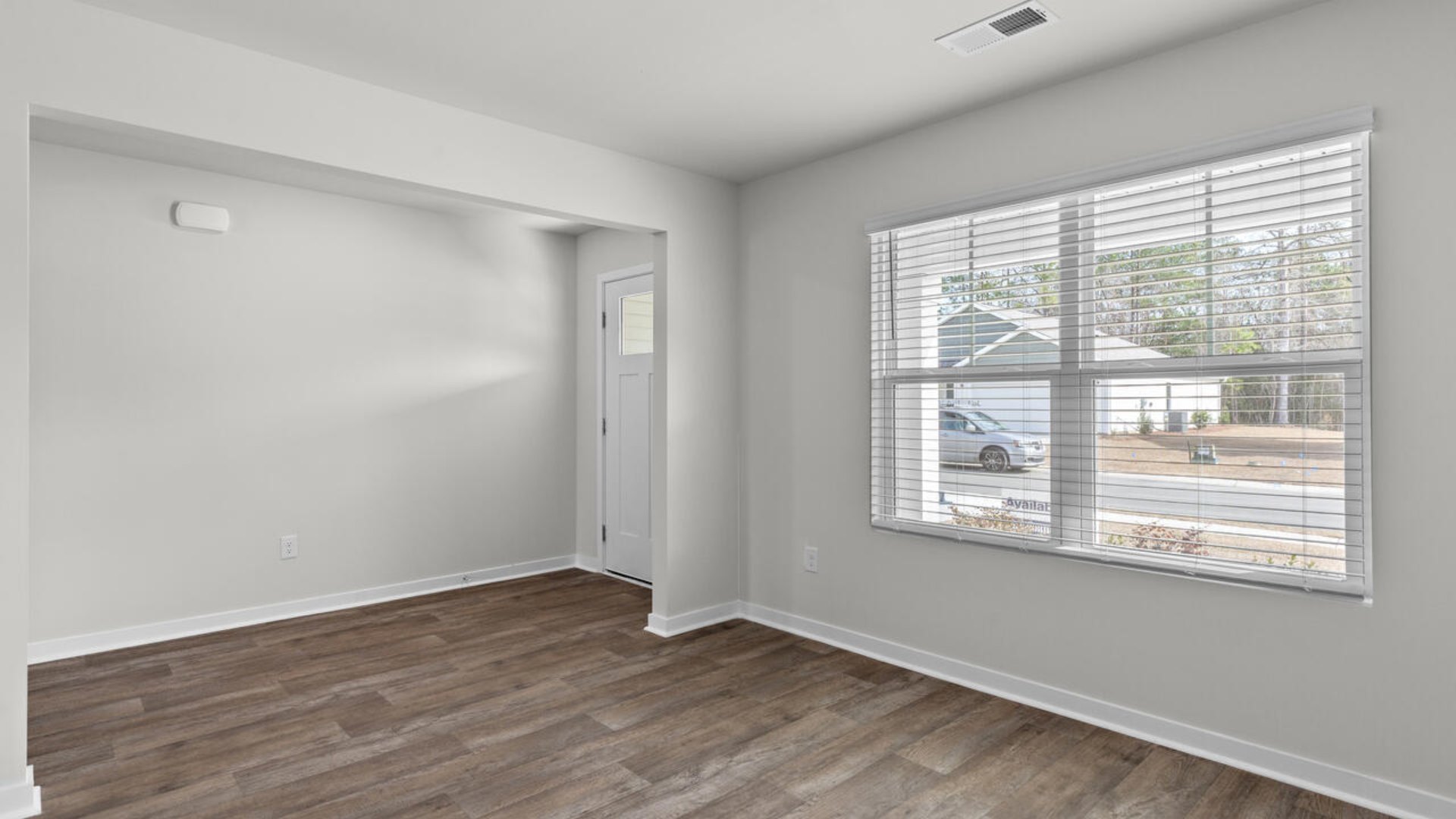 Downstairs, a flex room can be used as an office or sitting area.