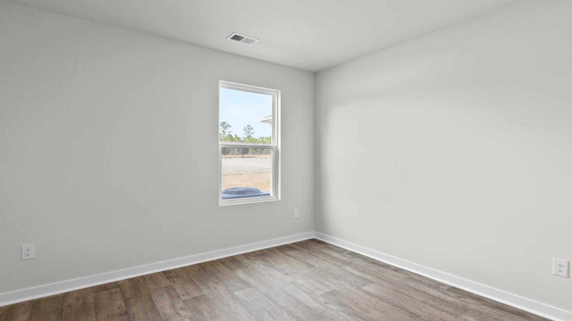 Downstairs, a flex room can be used as an office or sitting area.