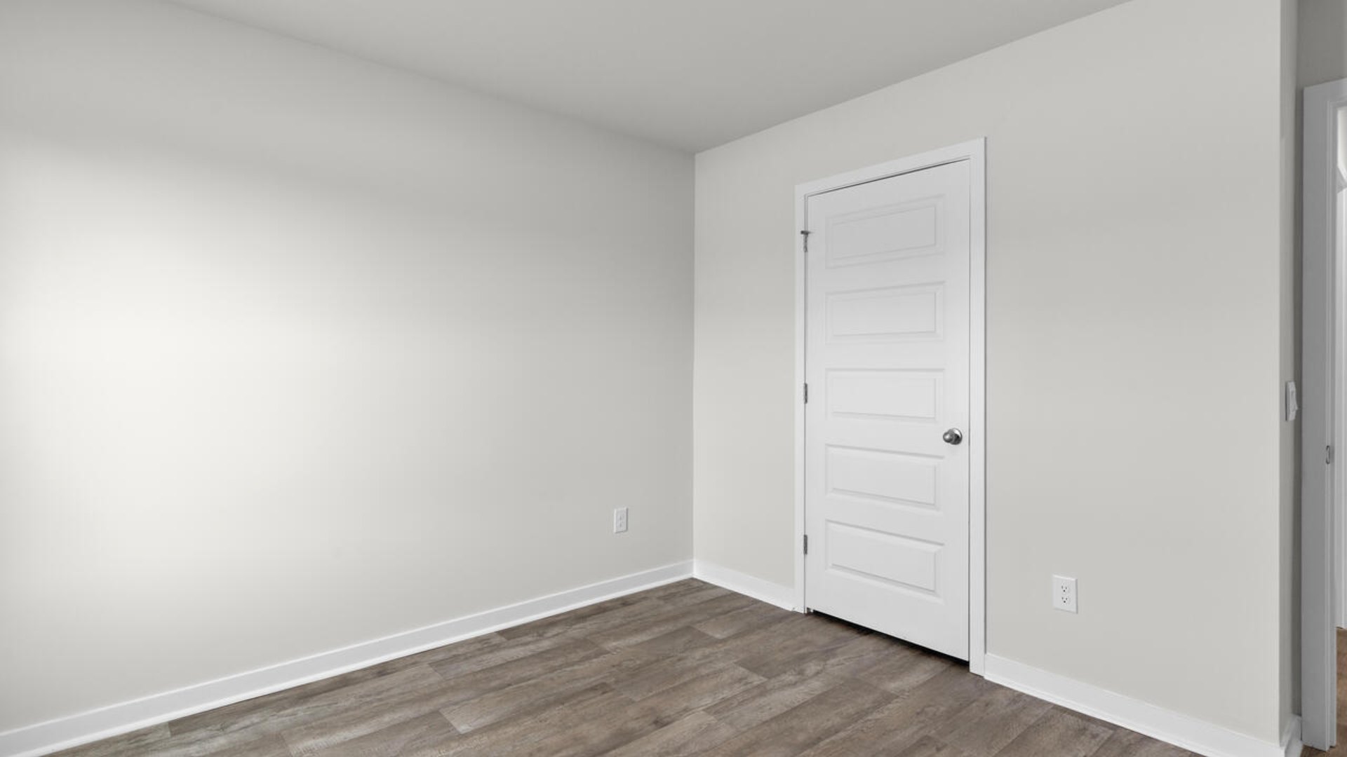 Downstairs, a flex room can be used as an office or sitting area.