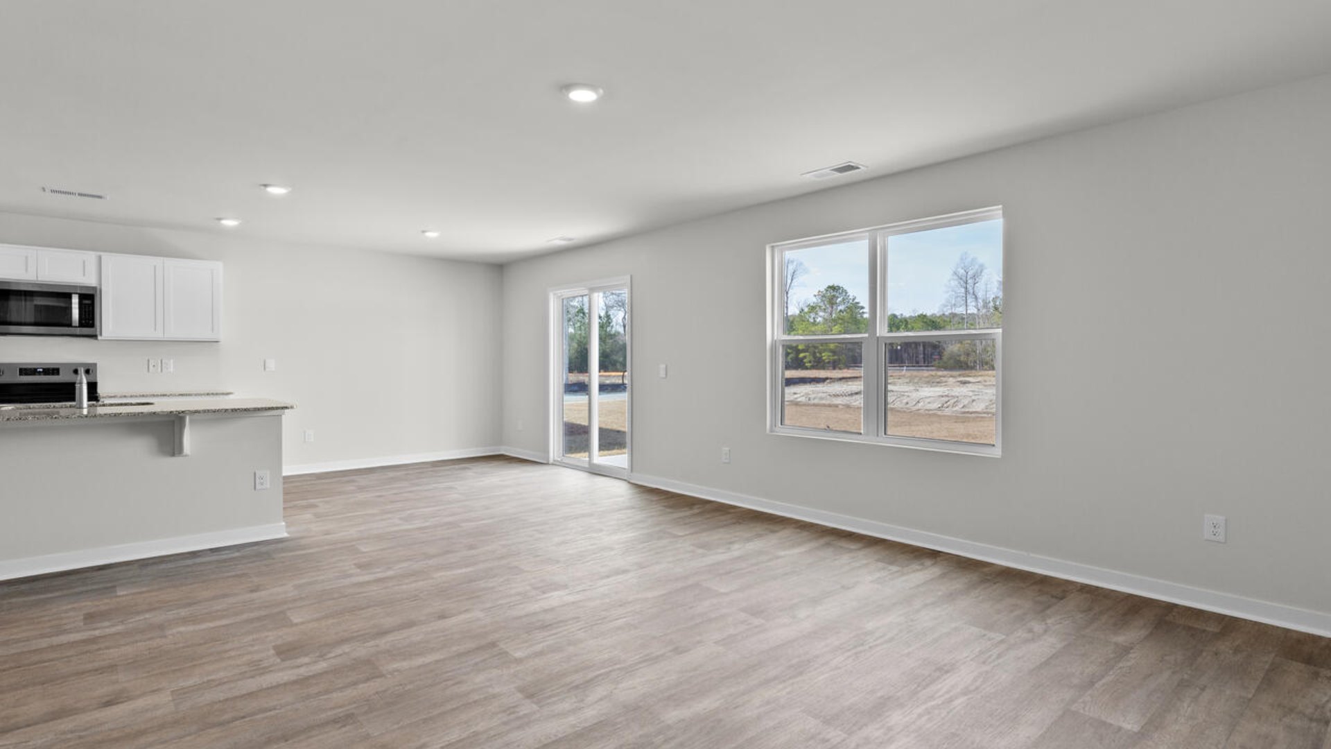 The Hayden offers 2,511 square feet with 5 bedrooms, 3 full bathrooms, 2-car garage and is one of our two-story floorplans featured in Brookside in Richlands, North Carolina. With 3 modern exteriors to choose from, the Hayden is sure to turn heads.