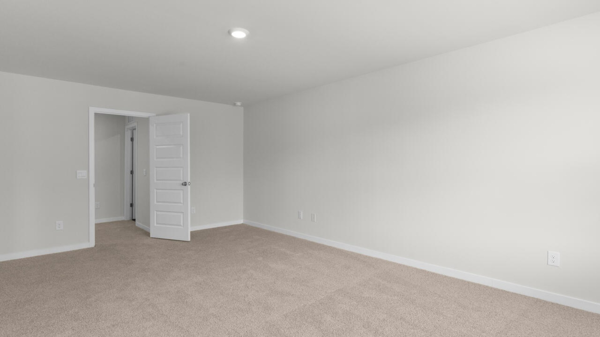 The upstairs has an additional living space, a laundry room, and a Primary Bedroom.