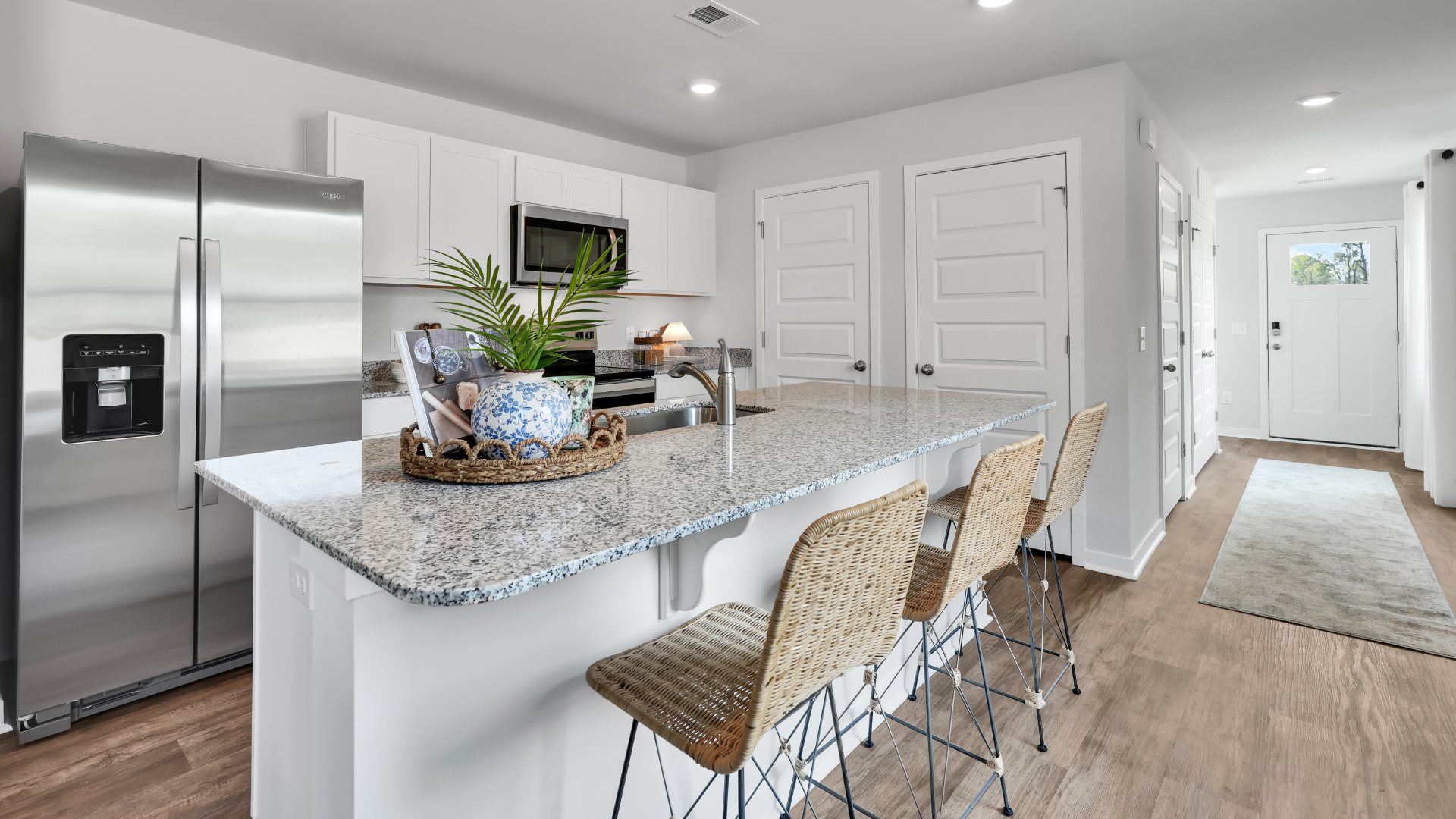 This appealing one-story layout optimizes living space with an open concept kitchen situated in between the living room and dining room and all bedrooms upstairs.