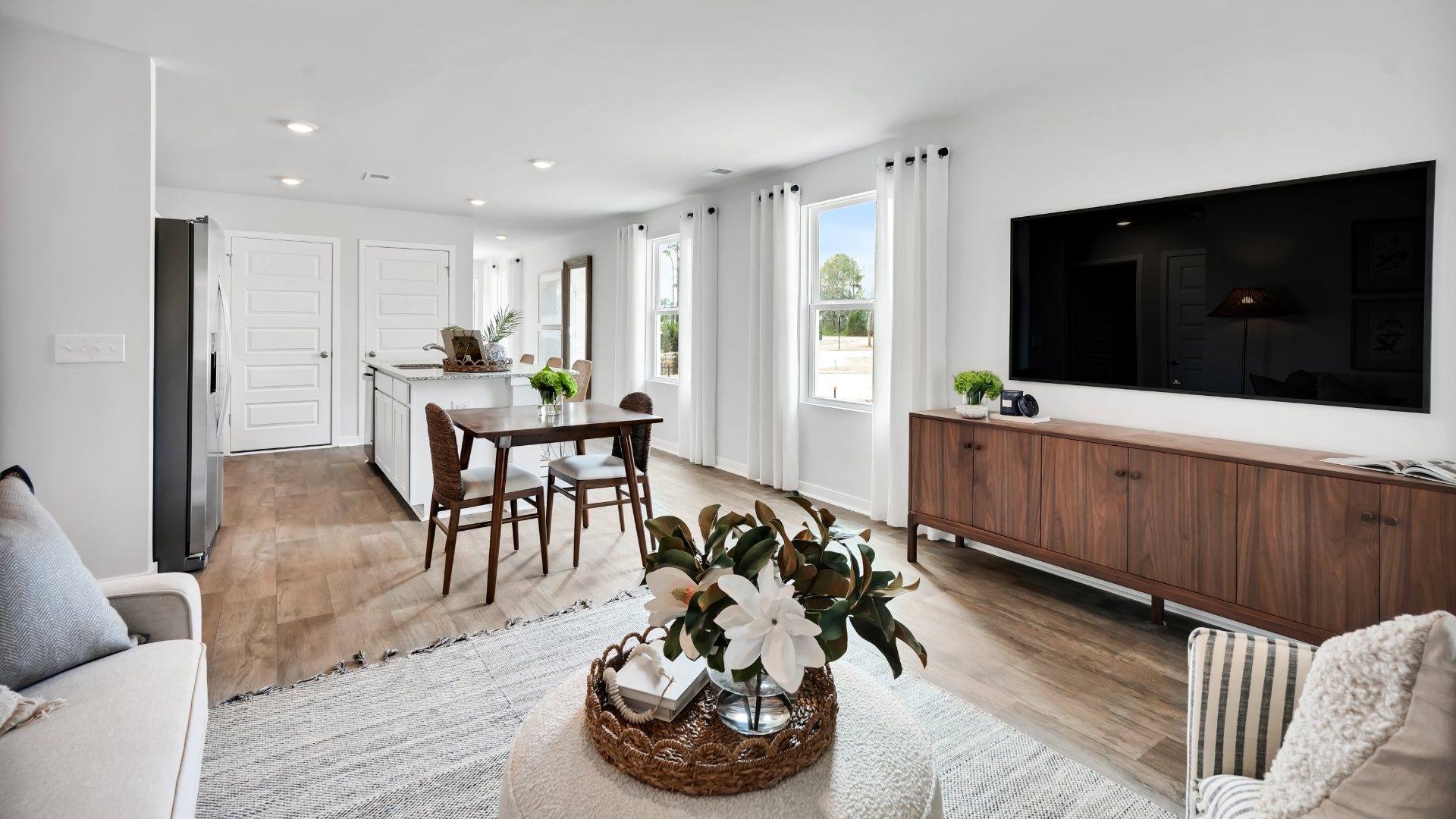 Welcome the Downing a 3-bedroom, 2-bathroom home, you’ll find 1,257 square feet of comfortable living. The living area is an open concept, where your kitchen, living, and dining areas blend seamlessly into a space perfect for everyday living and entertaining.