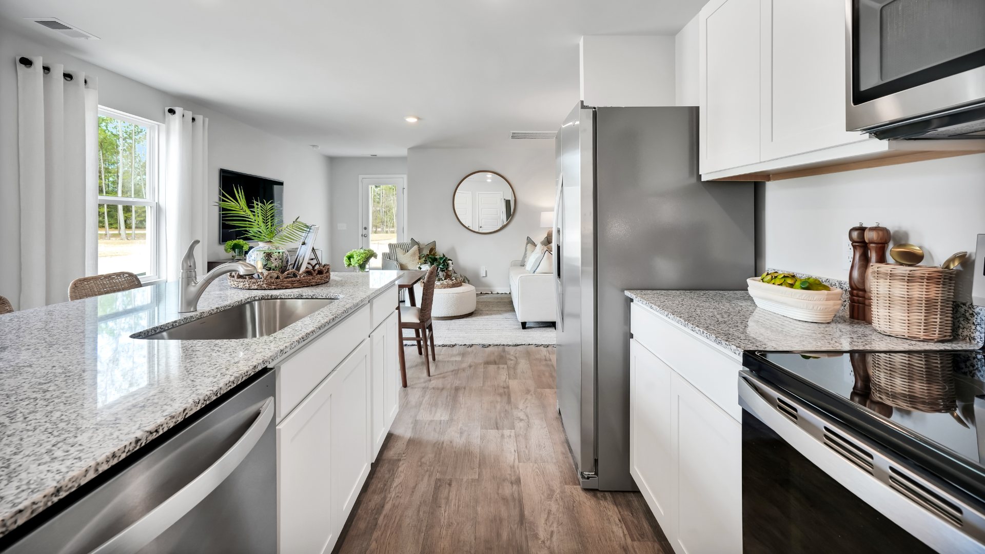 This appealing one-story layout optimizes living space with an open concept kitchen situated in between the living room and dining room and all bedrooms upstairs.