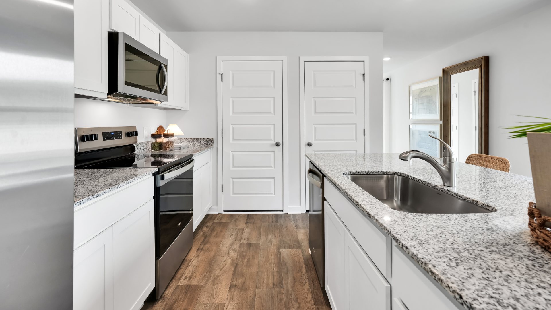 This appealing one-story layout optimizes living space with an open concept kitchen situated in between the living room and dining room and all bedrooms upstairs.