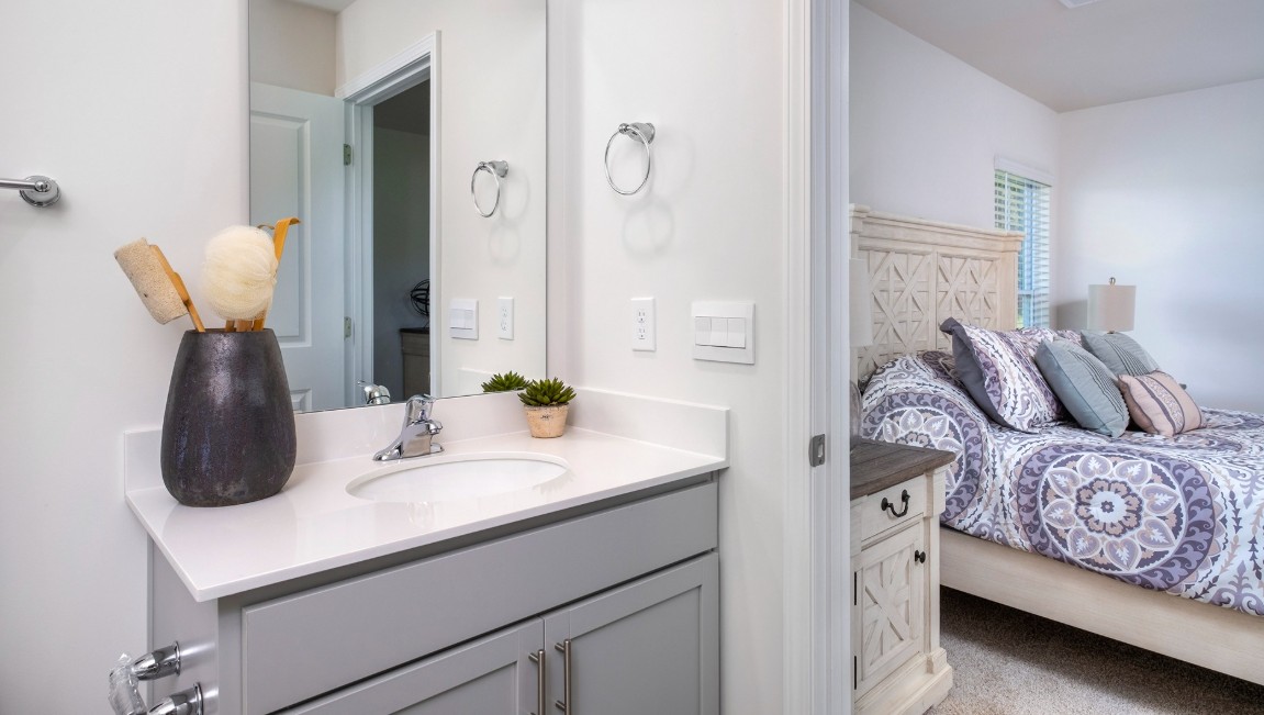 The primary bedroom has its own attached bathroom that features a walk-in closet and all the space you need to get ready in the morning.