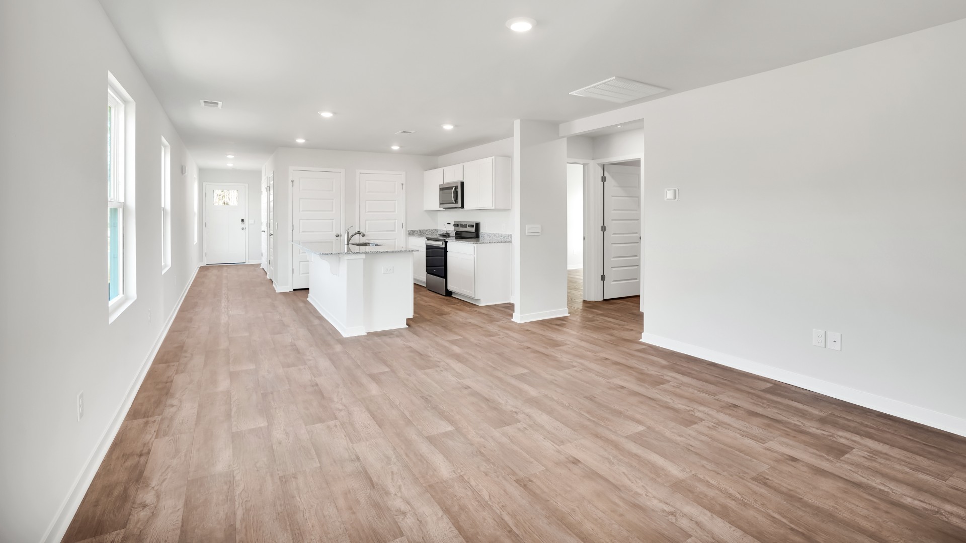 This appealing one-story layout optimizes living space with an open concept kitchen situated in between the living room and dining room and all bedrooms upstairs. The living room overlooks a covered patio perfect for relaxing and entertaining outdoors.
