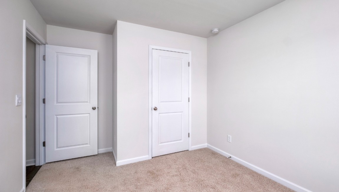 . Two other bedrooms share a second bathroom.