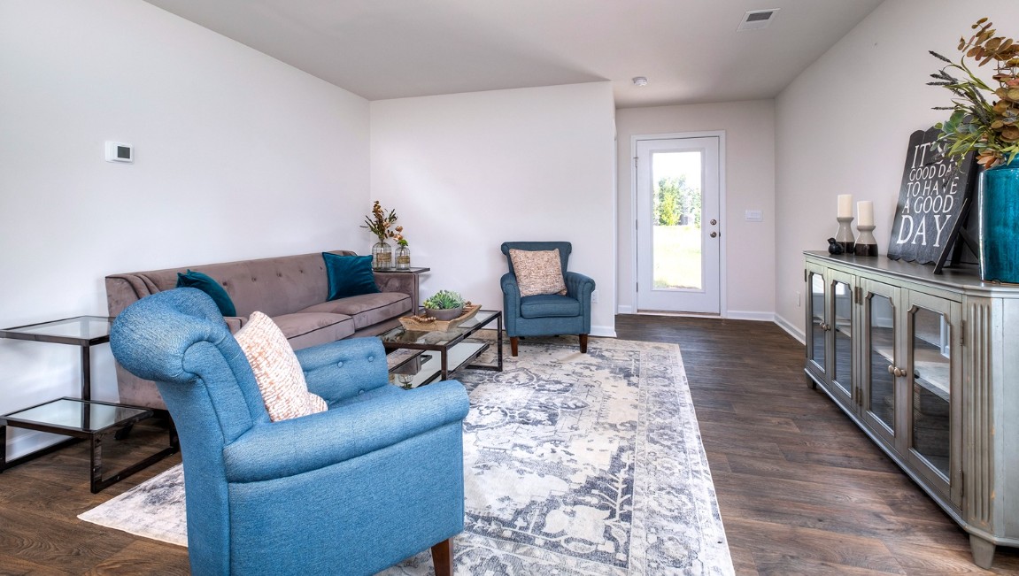 This appealing one-story layout optimizes living space with an open concept kitchen situated in between the living room and dining room and all bedrooms upstairs