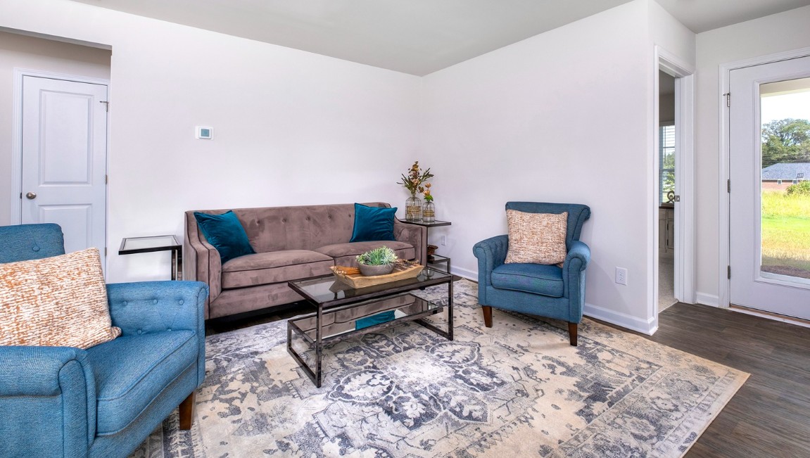 This appealing one-story layout optimizes living space with an open concept kitchen situated in between the living room and dining room and all bedrooms upstairs