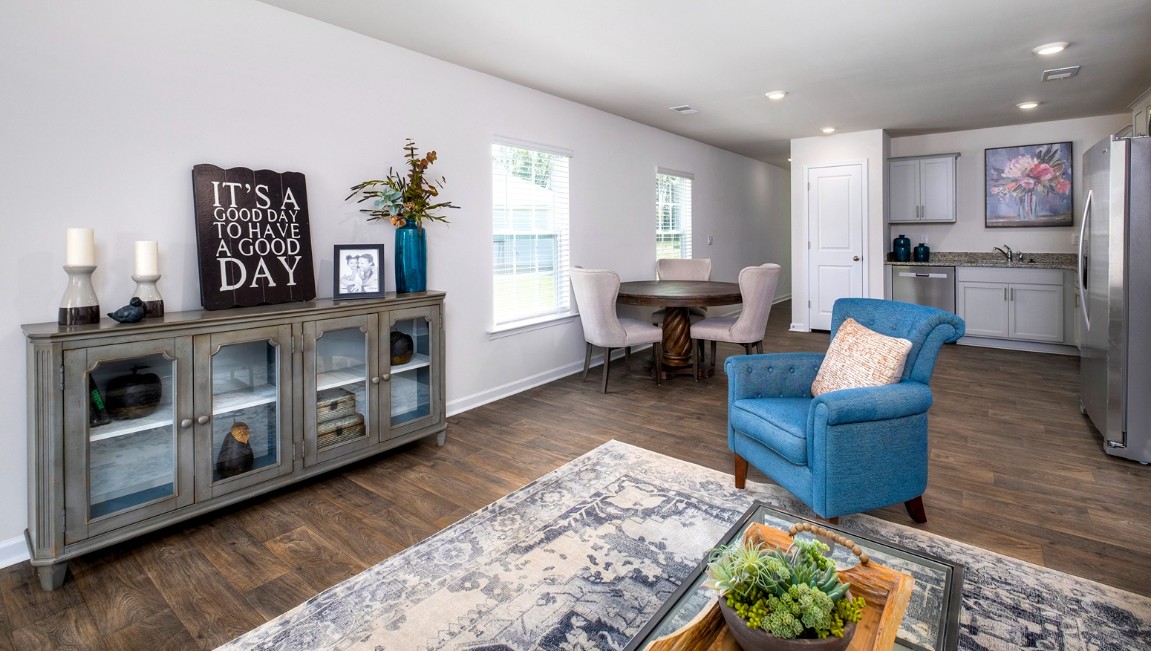 This appealing one-story layout optimizes living space with an open concept kitchen situated in between the living room and dining room and all bedrooms upstairs